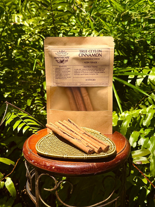 Ceylon Alba Cinnamon - True Ceylon Cinnamon sticks displayed alongside packaging outdoors.