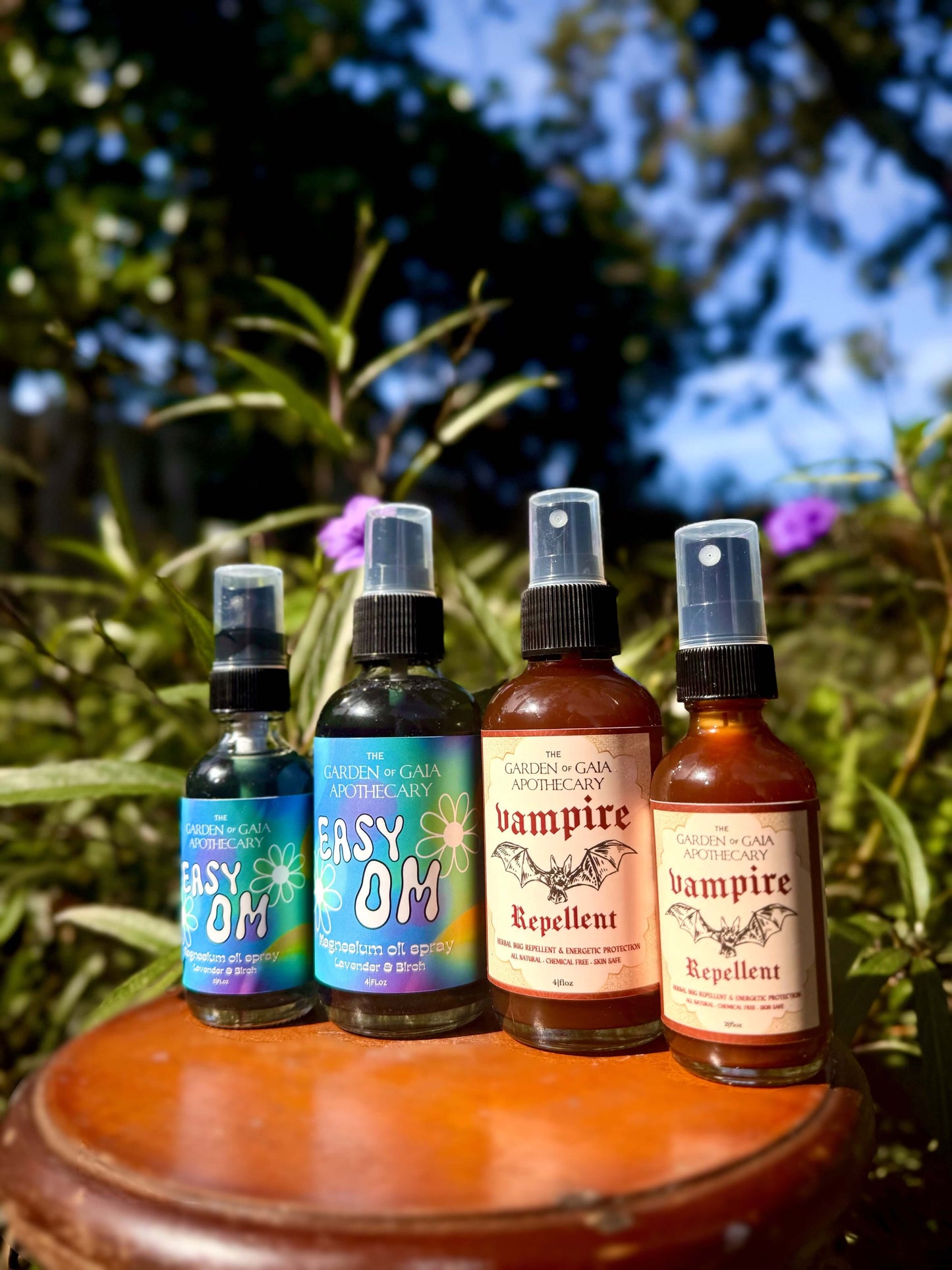 Vampire Repellent Non-Toxic Herbal Bug Spray and related products on a wooden table outdoors