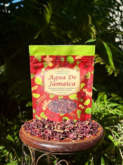 Agua De Jamaica - Revitalizing Hydrating & Nourishing Loose Leaf Tea in vibrant packaging with dried hibiscus flowers.