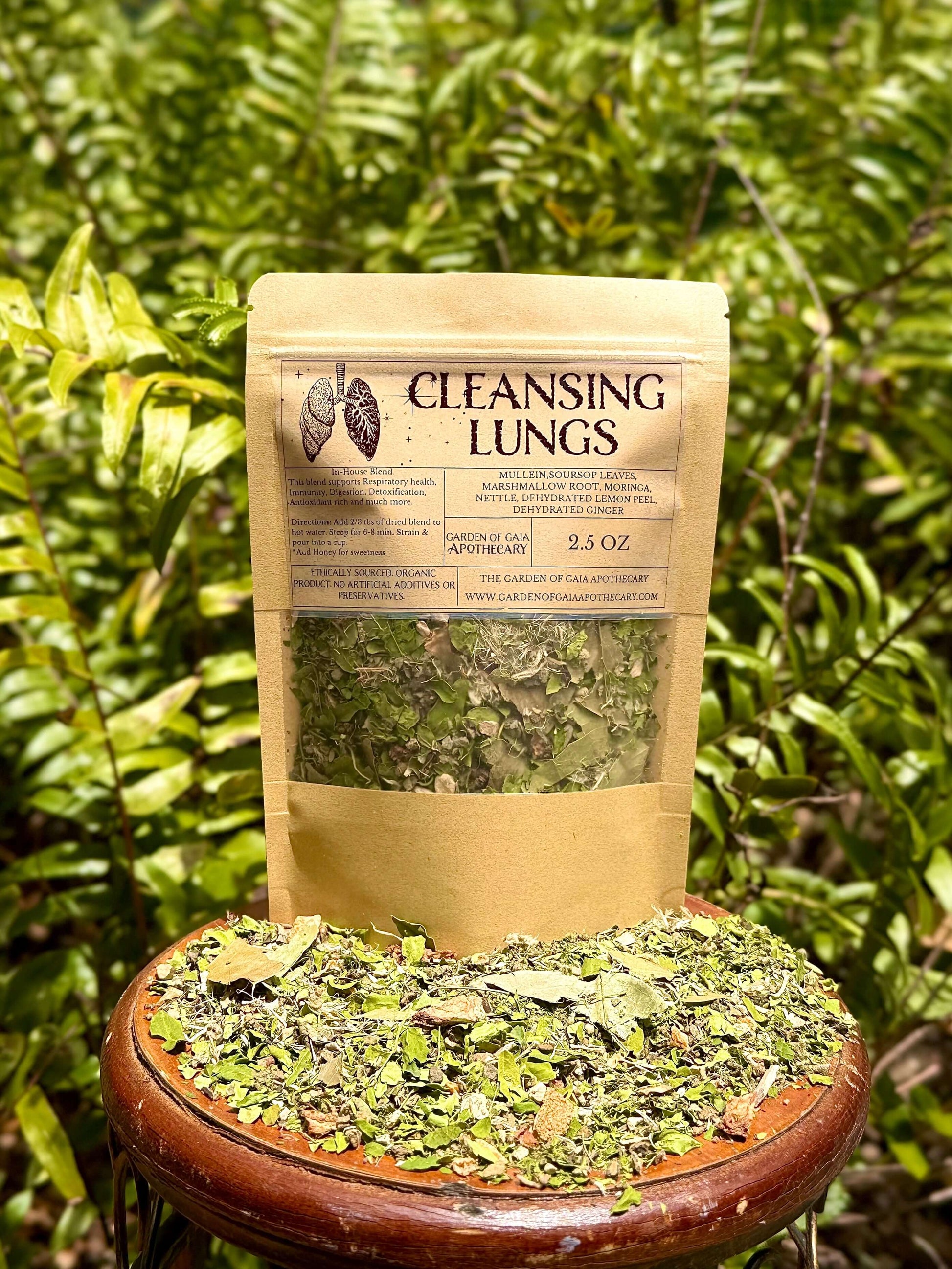 Cleansing Lungs Respiratory Digestion Immunity Herbal Tea Blend in eco-friendly packaging with herbs.