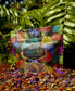 Rainbow Body-Cosmic Herbal Blend packaging with vibrant floral designs, surrounded by herbal leaves.