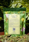 Cleansing Lungs Respiratory Digestion and Immunity Herbal Tea Blend packaging against a lush green background.
