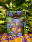 Lotus Trinity Bundle featuring Blue Lotus whole flower package surrounded by colorful petals.